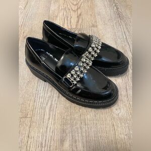 Gianni Bini Shiny Black Loafers with Silver Accents
